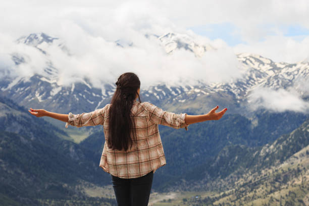 istock Woman traveller enjoying mountain view 843885046
