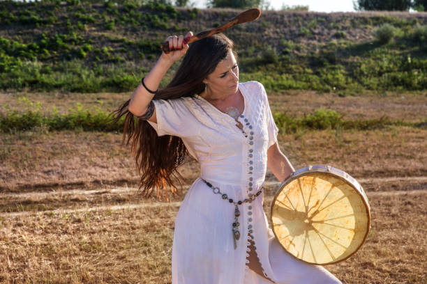 istock Gypsy woman drumming 2 843885300