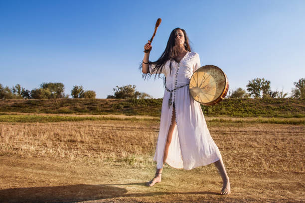 istock Shaman woman  drumming tall 843887770