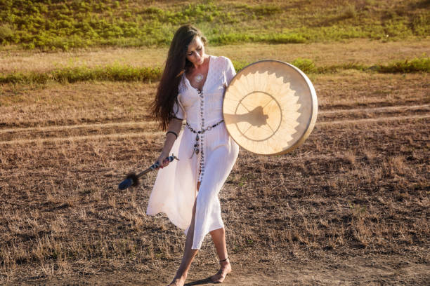 istock Shaman woman  drumming tall 843889546