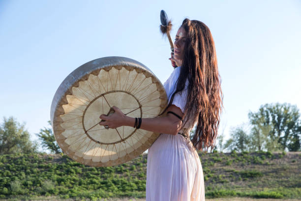 Shaman woman  drumming