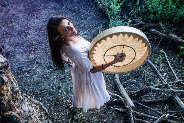 istock Shaman woman drumming 843893050