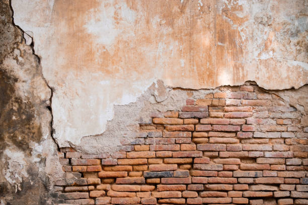 istock Old orange brick wall in antiquity 843893114