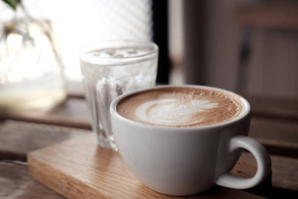 istock A cup of coffee put on wooden board 843893130