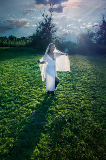 istock Shaman woman on the sunset field 843893148