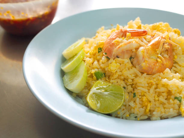 istock Thai local stir fried Jasmine rice with egg and shrimps, with fish sauce, perspective 843896224