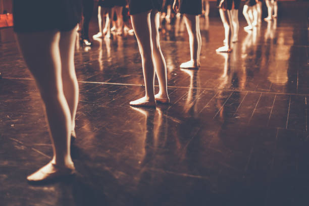 legs of young dancers ballerinas in class classical dance, ballet , Thailand , Color Black and White Style with copy space legs of young dancers ballerinas in class classical dance, ballet , Thailand , Color Black and White Style with copy space contemporary dance stock pictures, royalty-free photos & images