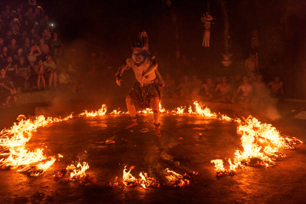 Bali, Indonesia - October 2015: Monkey God set to fire during one of the act during Uluwatu Kecak and Fire Dance, Bali, Indonesia