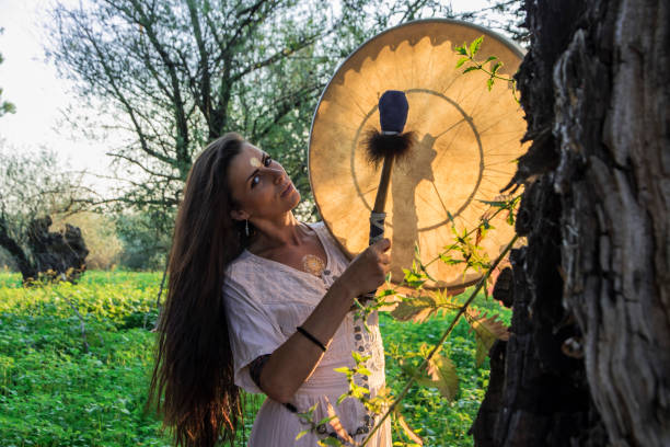 istock Shaman woman drumming 2 843899458