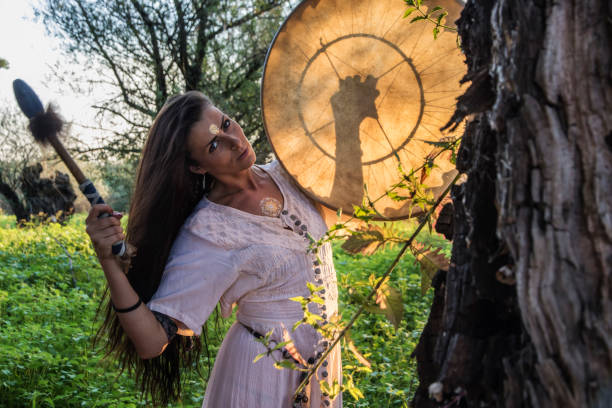 istock Shaman woman drumming 843899510