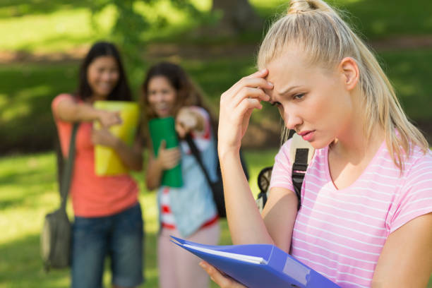 istock Female being bullied by group of students 843905720