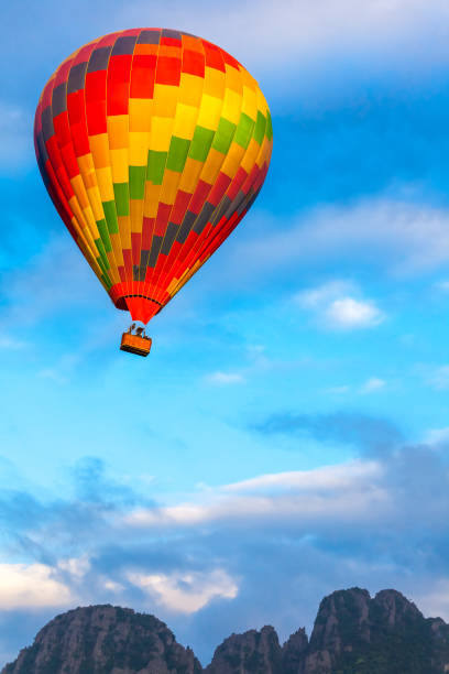 istock Colorful hot air balloon is flying 843906676