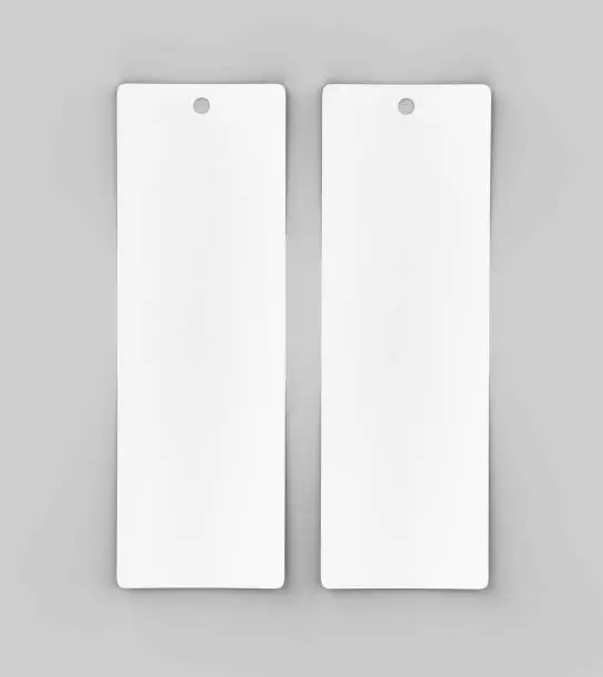 Photo of White blank tag or label and bookmark or bookmarker for template design and mock up. 3d render illustration.