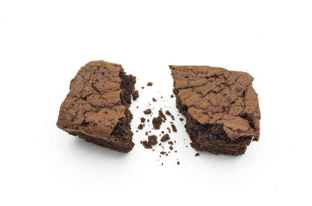 istock A Chocolate Brownie has slice isolated on whtie background. 843924408