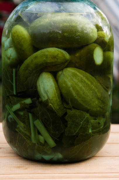 istock Homemade Canned Cucumbers in a glass jar 843942376
