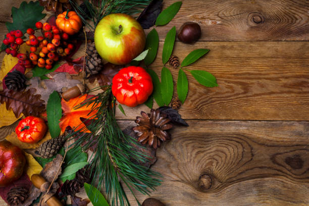 istock Fall greeting with acorn on wooden table 843950826