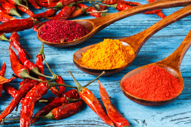 istock Red Chili pepper on wooden table 843950984