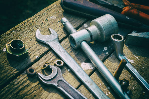 istock On weathered old wooden surface lie the tools 843962244