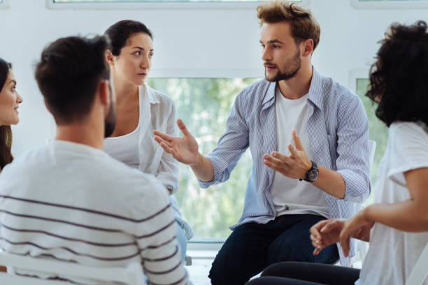 istock Handsome bearded man sharing his story 843963422