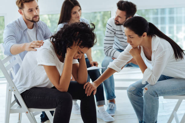 istock Professional female psychologist comforting her patient 843966680