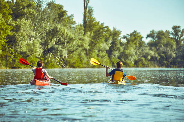 istock A canoe trip along the river along the forest in summer. 843969360