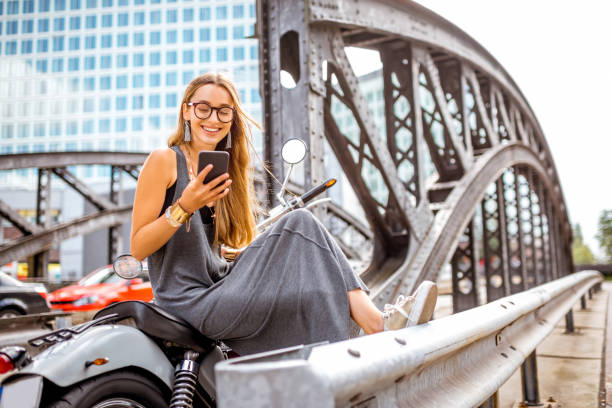 istock Business woman on the motorcycle 843972688