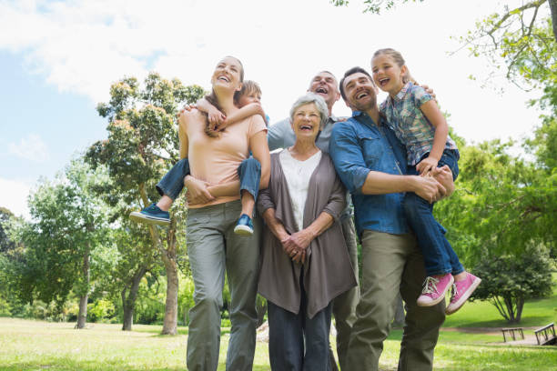 istock Cheerful extended family at park 843972700