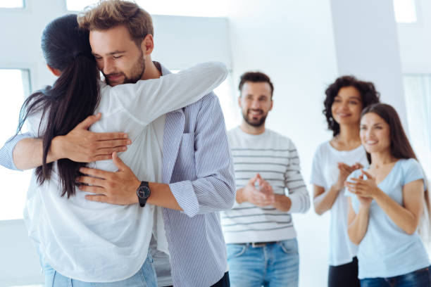 istock Cheerful delighted people standing together 843972840