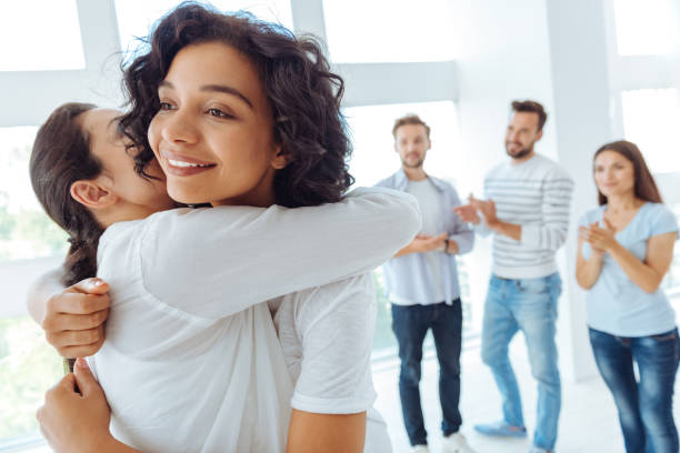 istock Joyful positive woman hugging her friend 843973002