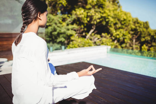 istock Calm brunette doing yoga 843973800