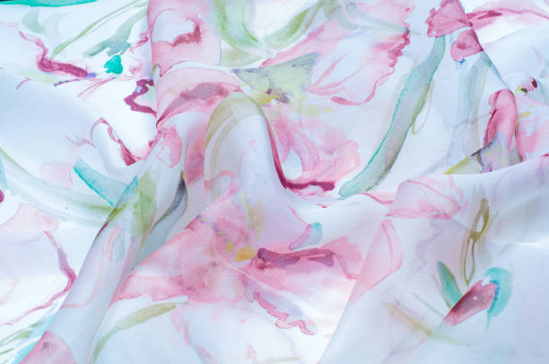 istock Fabric silk texture, painted with flowers 843973858