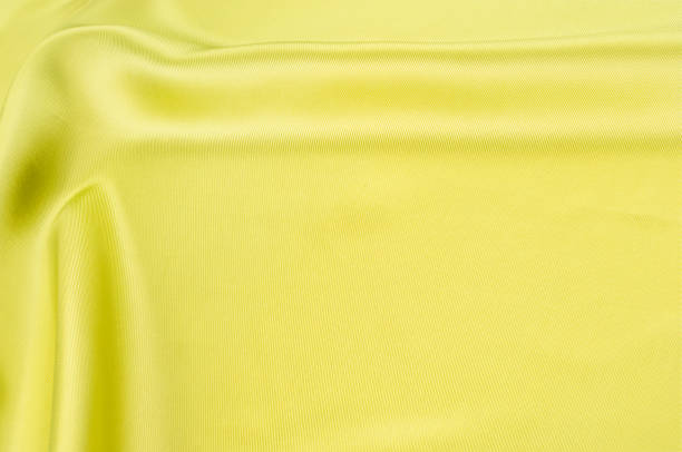 istock green silk fabric texture, salad coloring 843976196