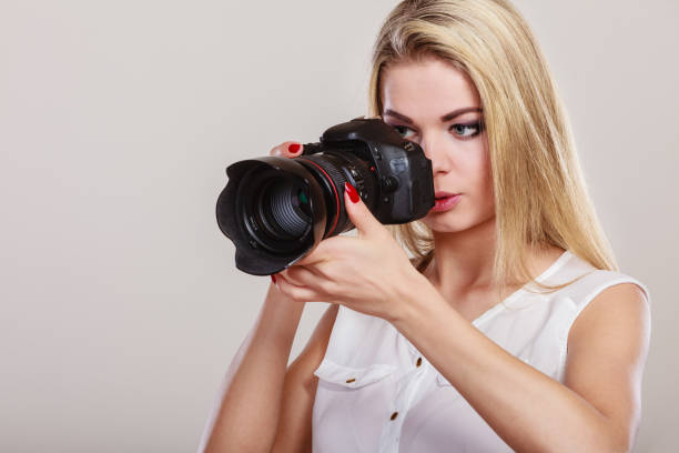 istock Beautiful woman with camera. 843976714