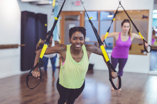 istock Group of Women Doing TRX Workout 843982042