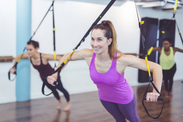 istock Group of Women Doing TRX Workout 843982070