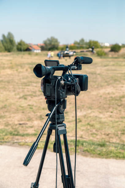 istock Video camera, outdoor setup and covering an event 843986312