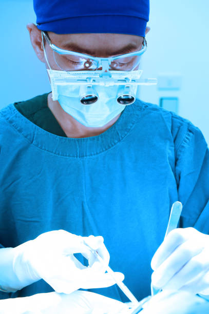 istock veterinarian surgeons in operating room 843986910