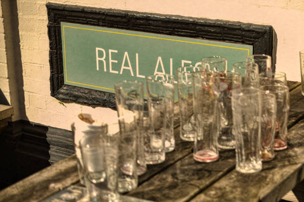 istock Beer and drink glasses on a table outside a public house. 844000518