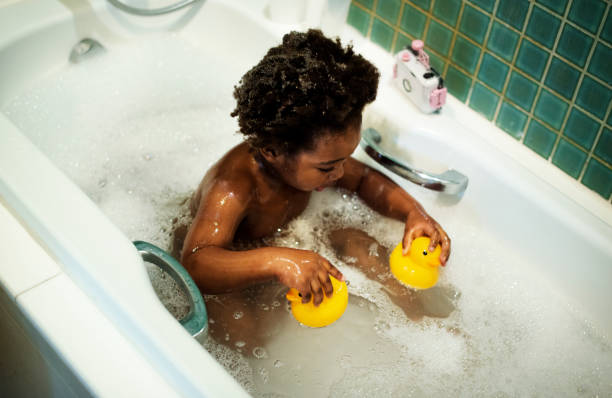istock African descent kid enjoying bath tub 844004830