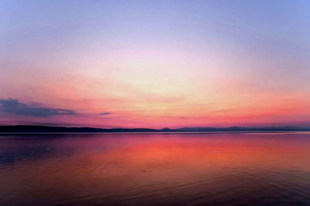 istock orange and blue sunset on the lake 844008210