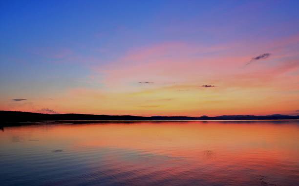 istock orange and blue sunset on the lake 844008218