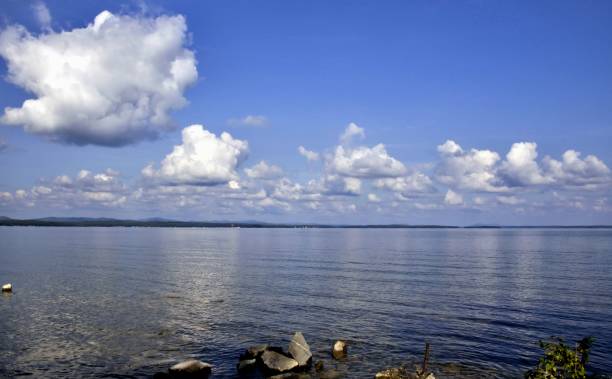 istock Cumulus clouds over the lake in the morning 844008300