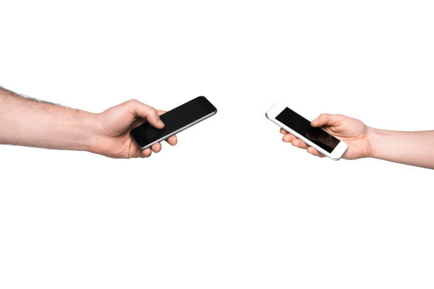 istock man and woman using smartphones 844015416