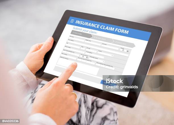 Insurance Claim Form Stock Photo - Download Image Now - Insurance, Claim Form, Strategy