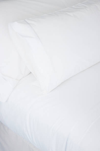 istock Luxury five star hotel bedroom bed sheets and linen clean 844027510