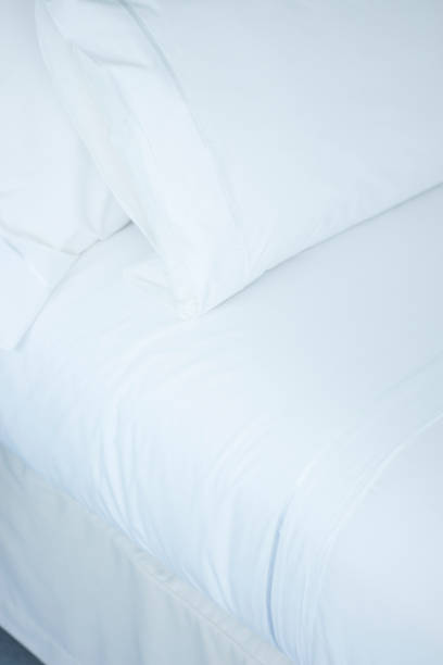 istock Luxury five star hotel bedroom bed sheets and linen clean 844027536