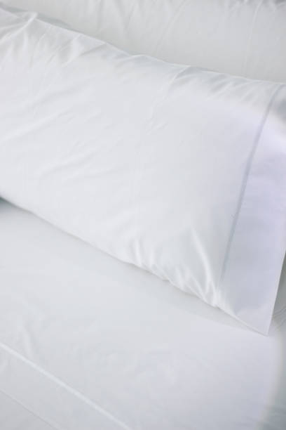 istock Luxury five star hotel bedroom bed sheets and linen clean 844027564