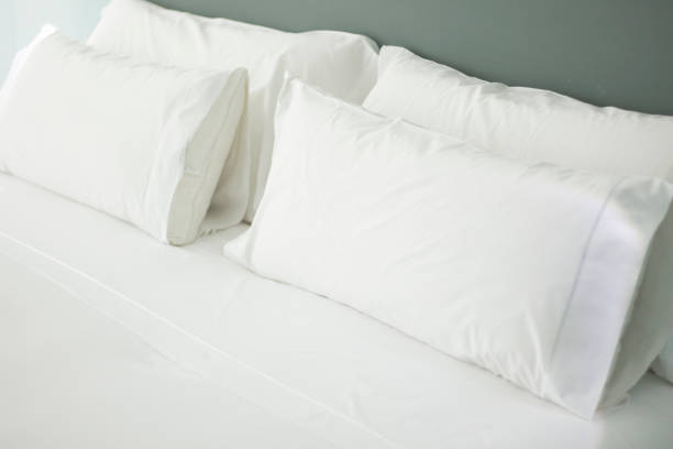 istock Luxury five star hotel bedroom bed sheets and linen clean 844027942