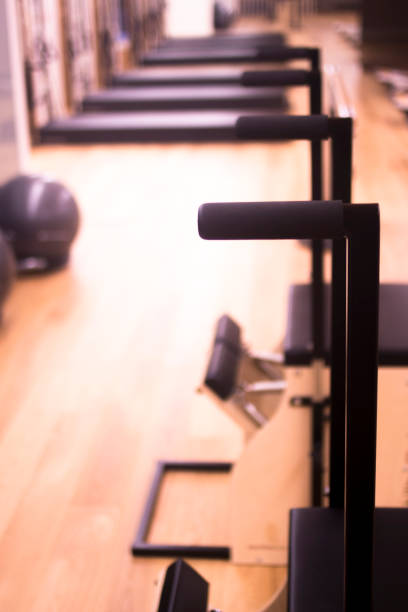 istock Pilates exercise training and flexibility stretching machine in gym yoga studio 844030780