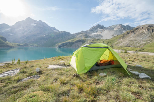 istock Campsite settled by a mountain lake 844031150